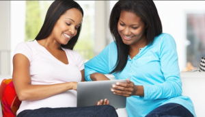 Blog 2 women at iPad